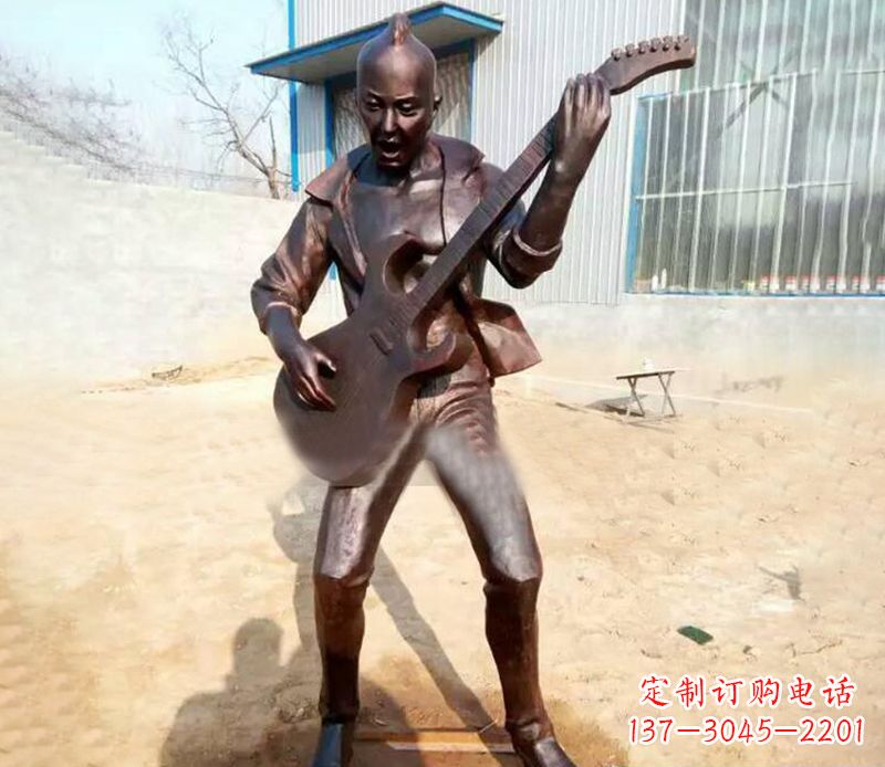 黄冈弹吉他的公园人物铜雕