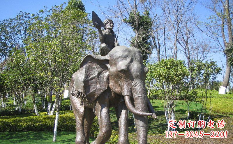黄冈公园骑大象的人物小品铜雕