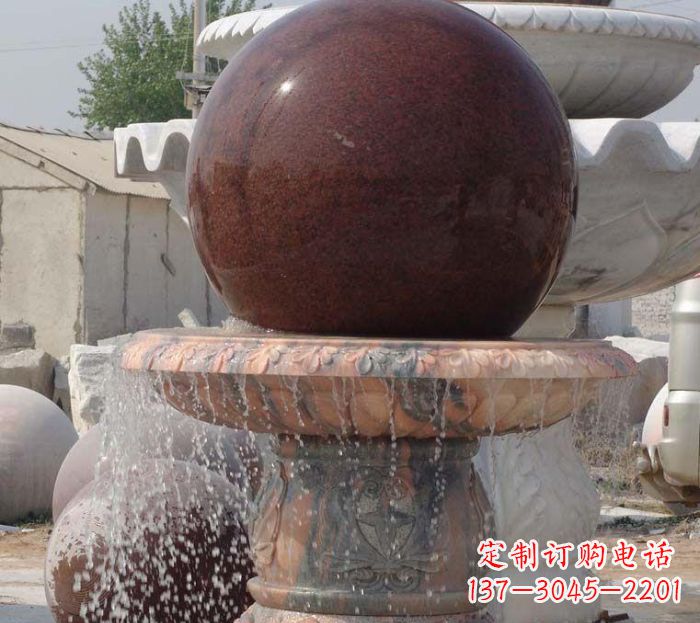 黄冈石来运转小型风水球喷泉石雕