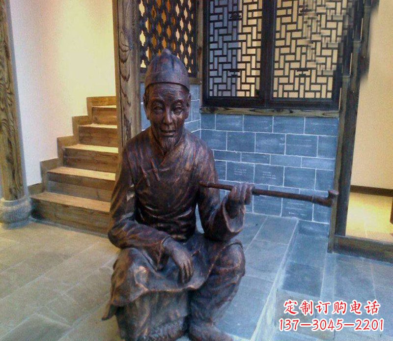 黄冈铜雕店小二吸烟庭院人物雕塑