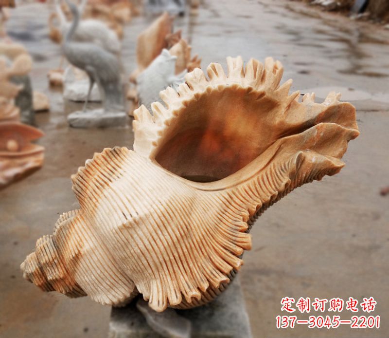 黄冈晚霞红海螺石雕广场景观雕塑