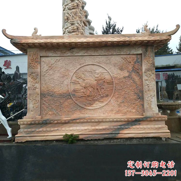 黄冈晚霞红麒麟影壁墙石雕