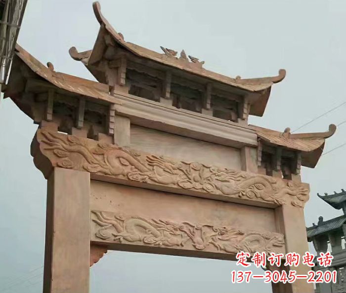 黄冈晚霞红石雕单门牌坊
