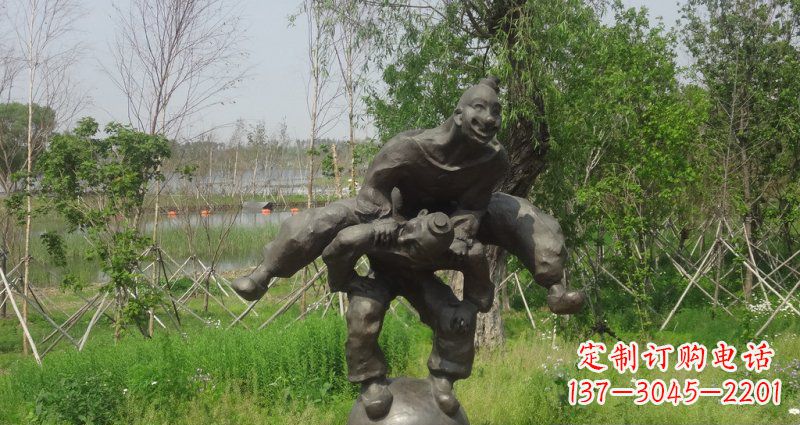 黄冈园林站在球上面跳山羊的人物景观铜雕